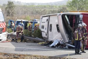 TARRAGONA, SPAIN - MARCH 20: Fire fighters are seen at the scene of an accident after a bus carrying university exchange students back from a popular festival crashed near Tarragona in north-east Spain, on March 20, 2016. At least 13 people are dead and dozens were injured Tjerk van der Meulen / Anadolu Agency